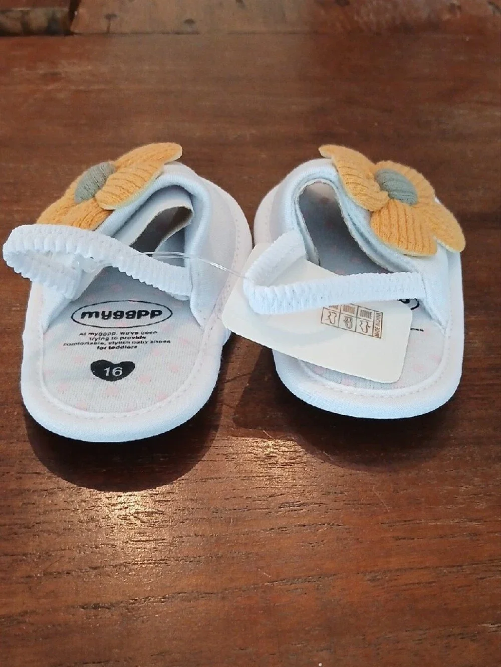 Infant White Sandals with Yellow Flower Accent